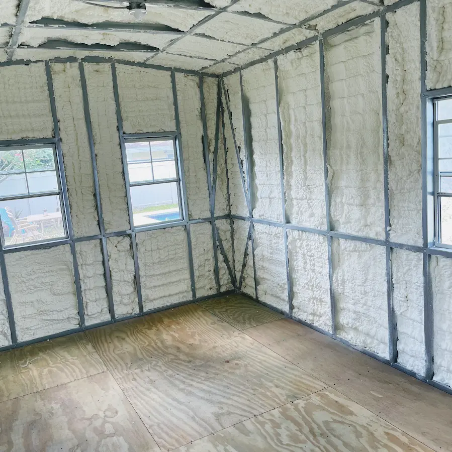 Closed-cell spray foam insulation applied to wall cavities in a residential project in Lantana